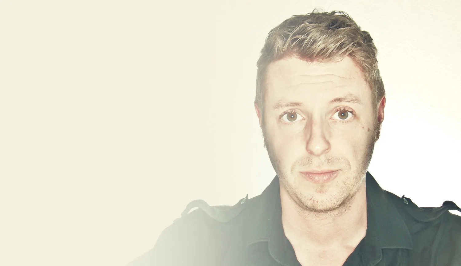 Steve Bowman, looking at the camera in his own high-key portrait.